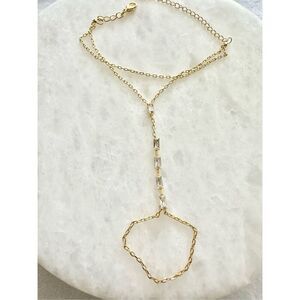 Cubic zirconia elongated radiant cut gold finger chain link bracelet ￼